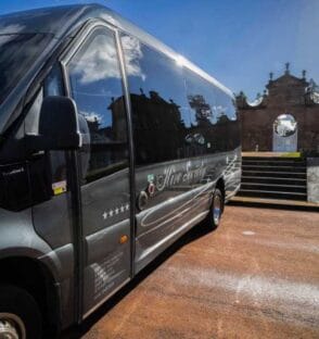 Hire Society Midi Coach for Corporate Scottish airport transfer