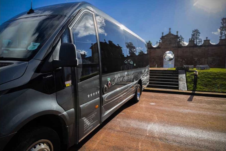 Hire Society Midi Coach for Corporate Scottish airport transfer 