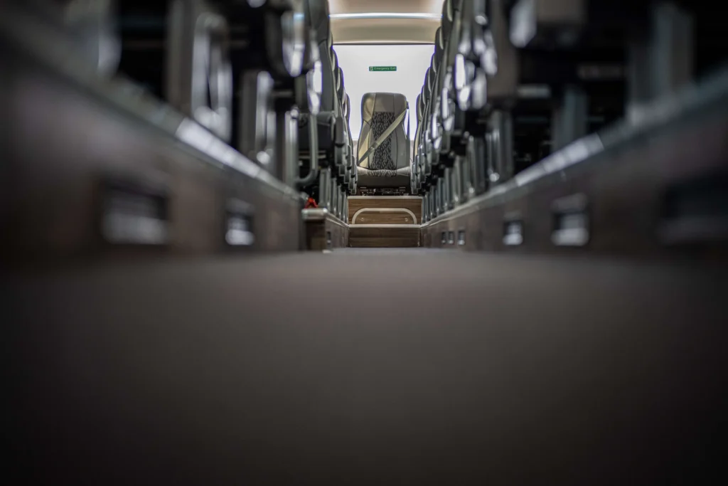 Yutong GT12 interior, luxury reclining seats with USB charging and LED mood lighting for group travel