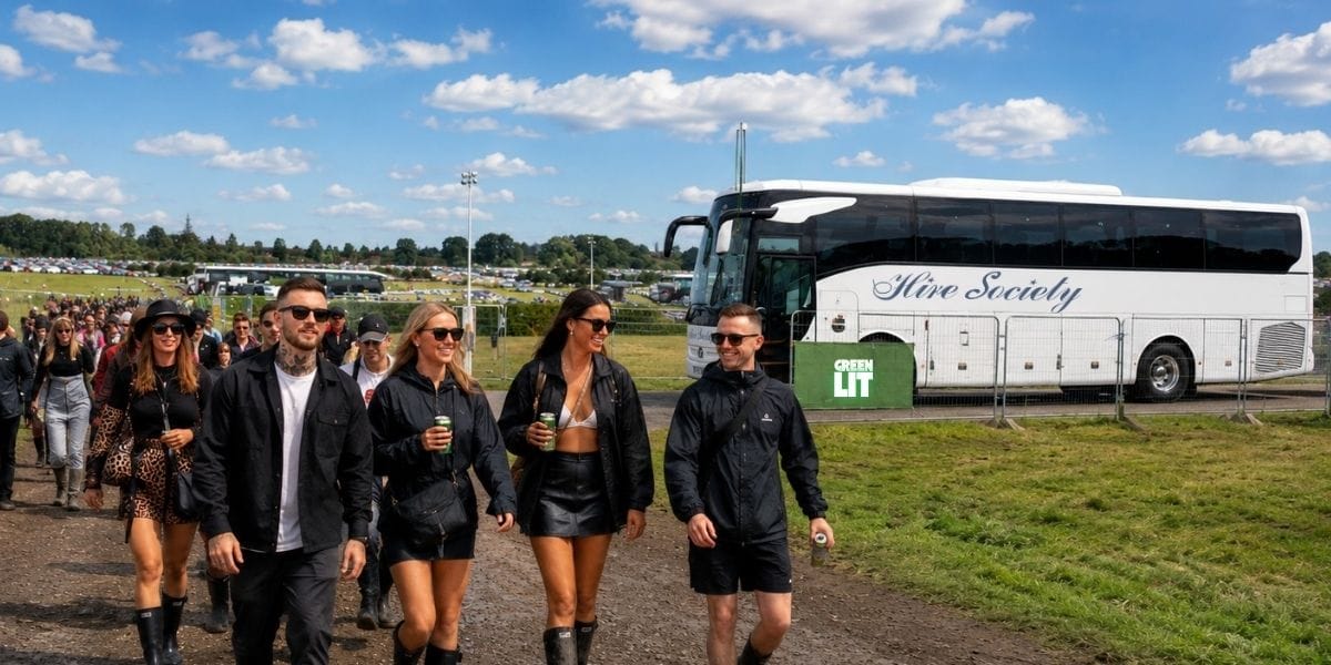 Festival coach hire Glasgow, group arriving by private coach at an outdoor music festival in Scotland